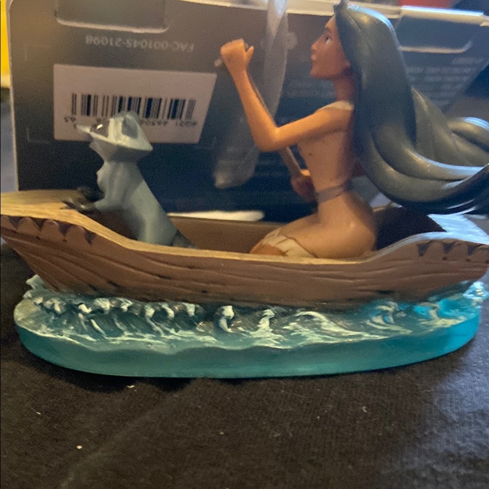 Disney Pocahontas and Meeko in Canoe with Blue Waves